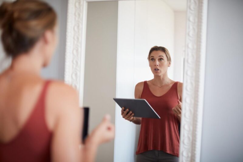 Talking in front of a mirror