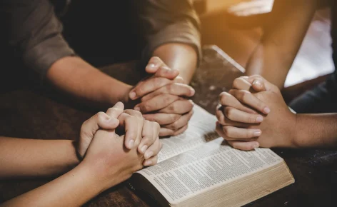 people praying together